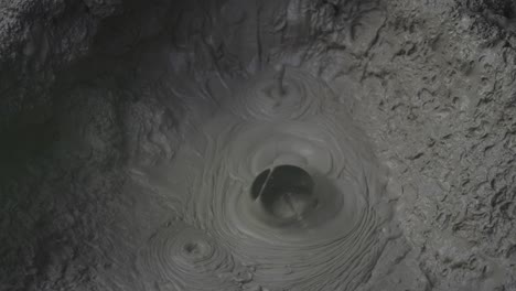 Nature&#039;s dance phenomenon of tiny mini geothermal mud circles popping