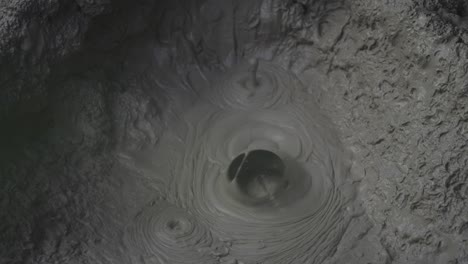 nature's dance phenomenon of tiny mini geothermal mud circles popping