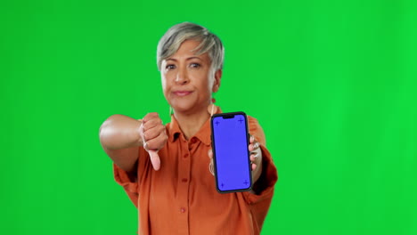 Woman,-thumbs-down-and-phone-by-green-screen