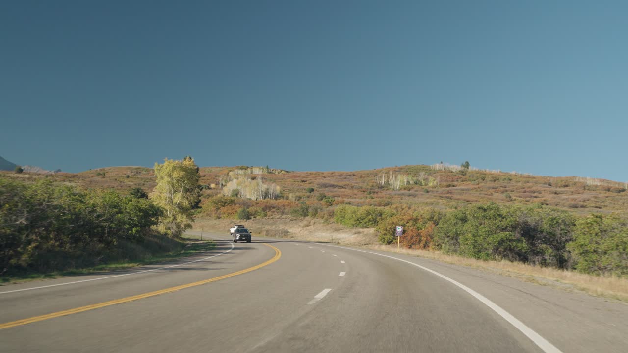 Scenic Road Trip Through Mountainous Terrain