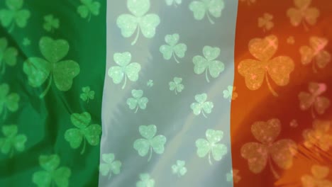 animation of flag of ireland over clovers