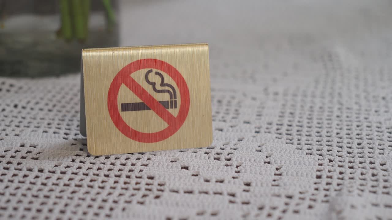 No Smoking Sign on a Table