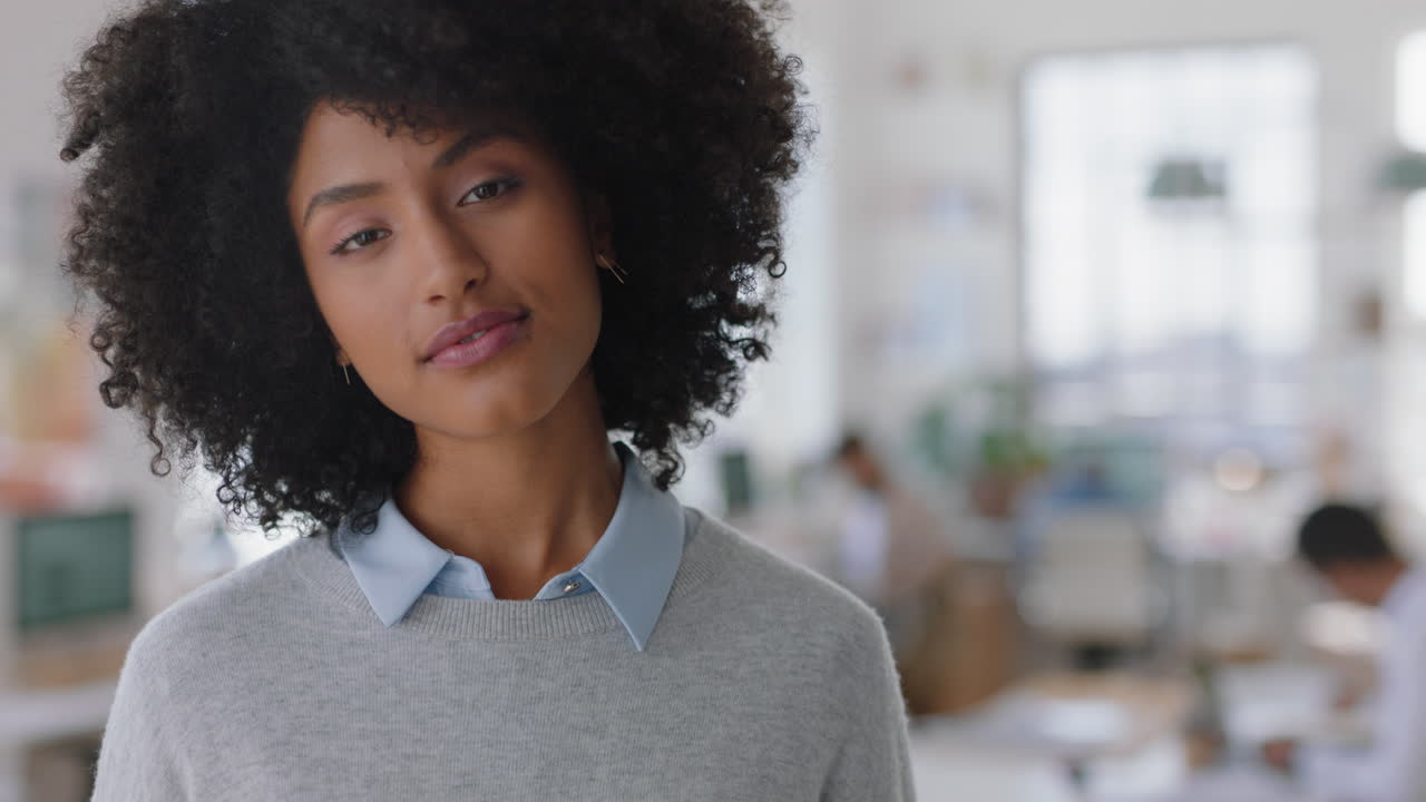 portrait happy business woman with afro smiling enjoying successful startup company proud entrepreneur in office workspace