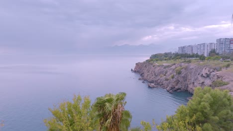 coastal view with mountains and city