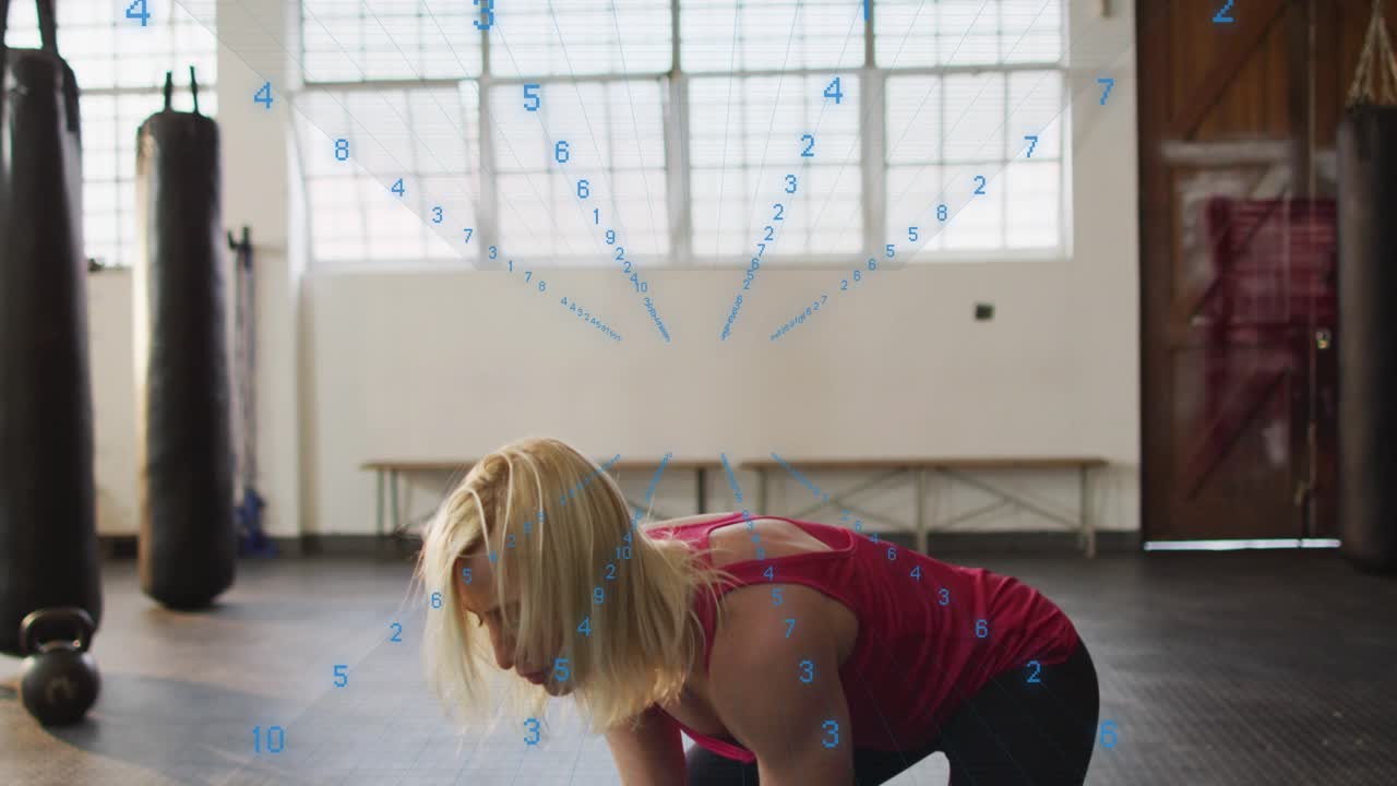 Woman driving hips starting kbell swing cycling overhead fitness blue nums overlay tracking motion