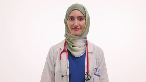 portrait of a female muslim doctor in a hijab with stethoscope