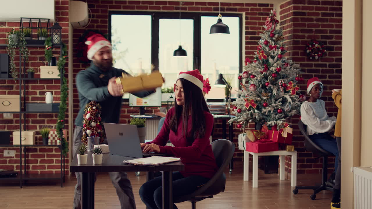 Diverse people giving gifts and presents to colleagues