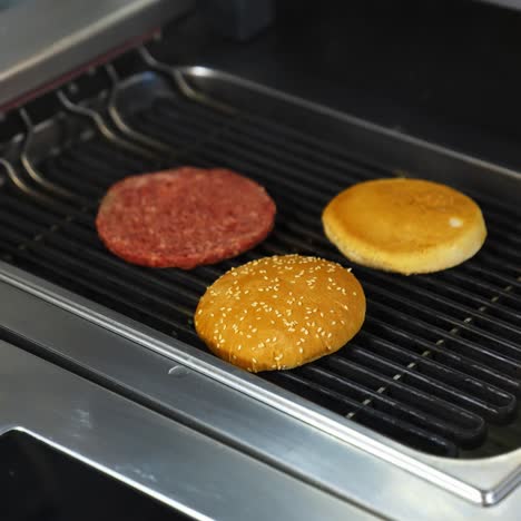 cooking beef and pork patty for burger. meat roasted at kitchen. slow motion