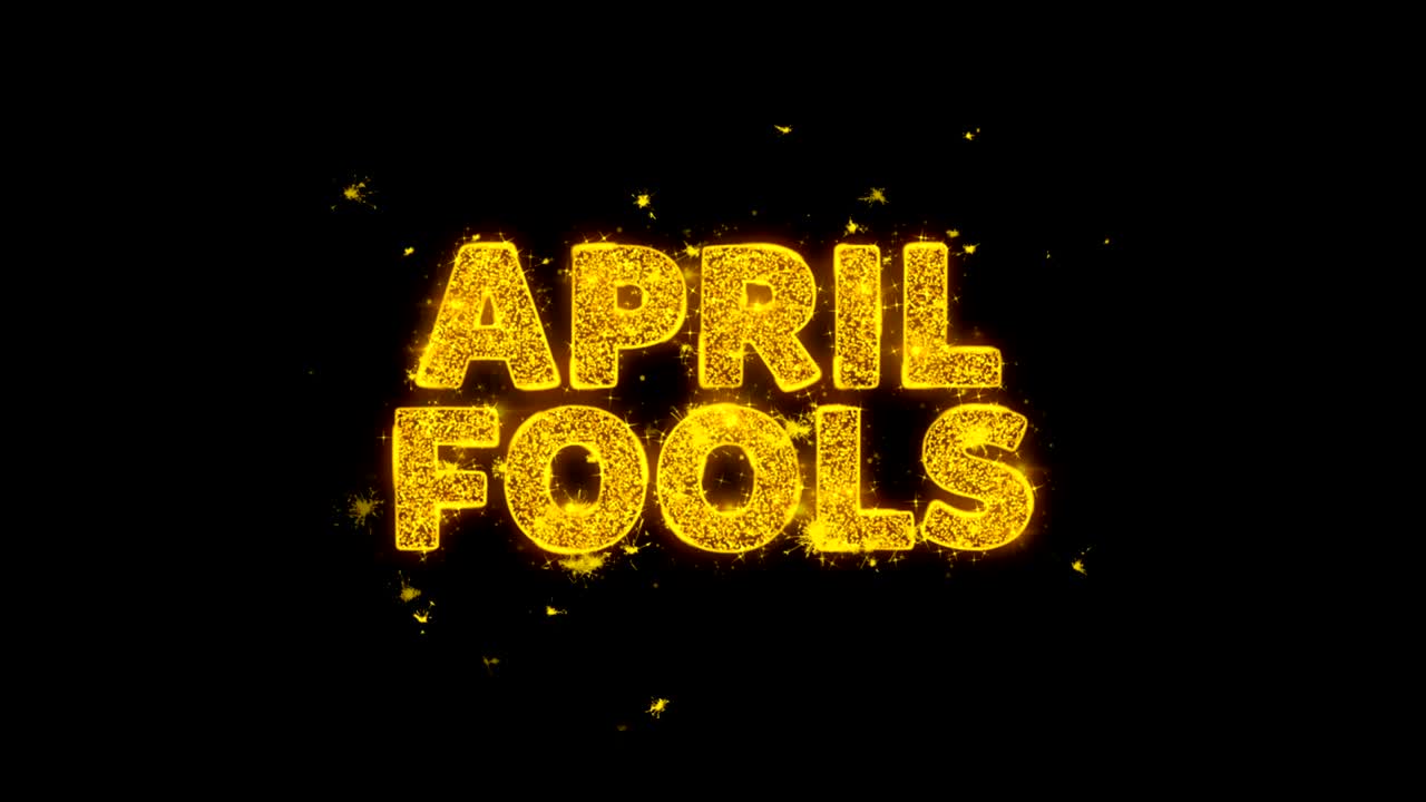 4월의 속임수 텍스트는 검은 바탕에 입자를 불꽃으로 만니다.