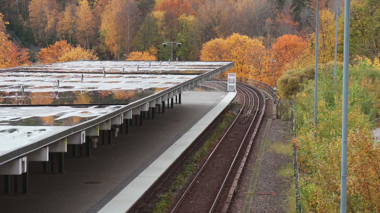 Empty subway station outside, in an autumn season