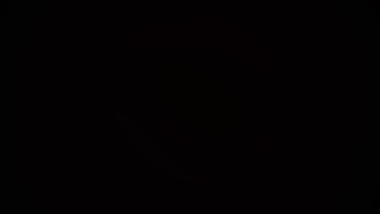 Abstract Red Light Flare Pulsing in Darkness