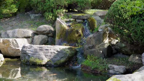 lake water fall in the garden of korean temple during autumn in south korea