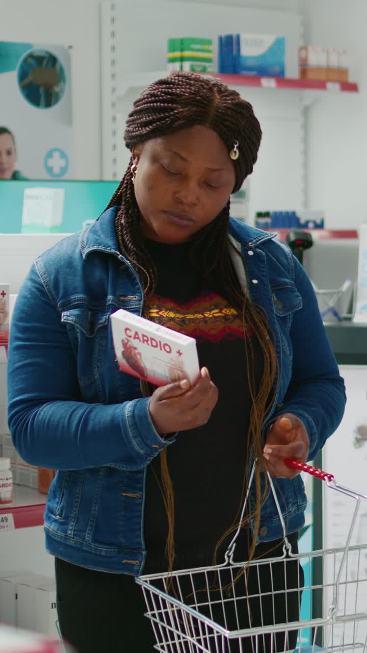 Vertical video: Health specialist explaining medicine pills to woman