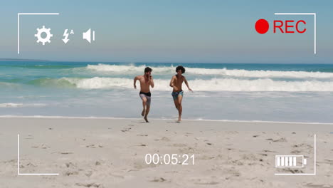 corriendo en la playa, dos niños capturados en la grabación de animación con temporizador e iconos