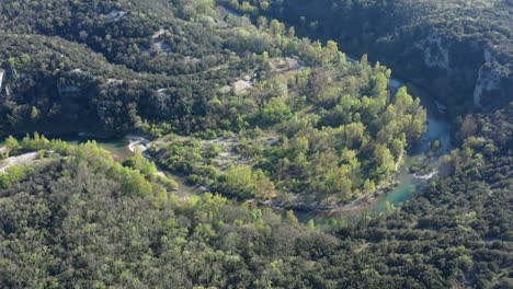 River-winding-Cevennes-national-park-aerial-shot-sunny-day