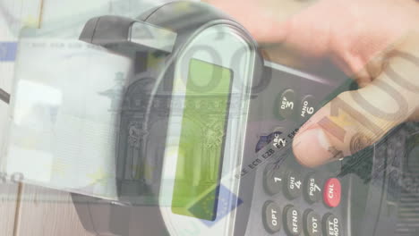 animation of hand using credit card payment terminal, over rotating euro notes