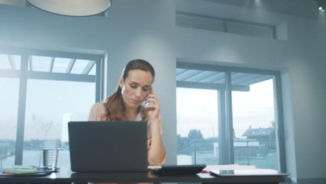 business woman talking phone. upset female person explaining on mobile phone.
