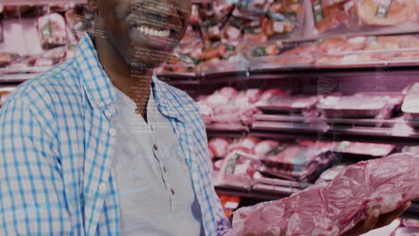 holding packaged meat in grocery store aisle, man smiling at camera