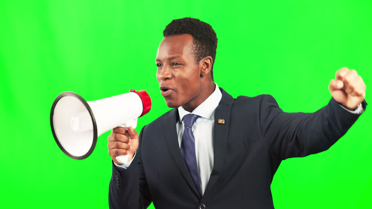 Protest, speaking and a black man with a megaphone