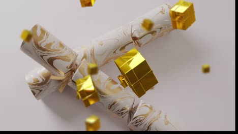 animation of christmas crackers and presents falling on white background