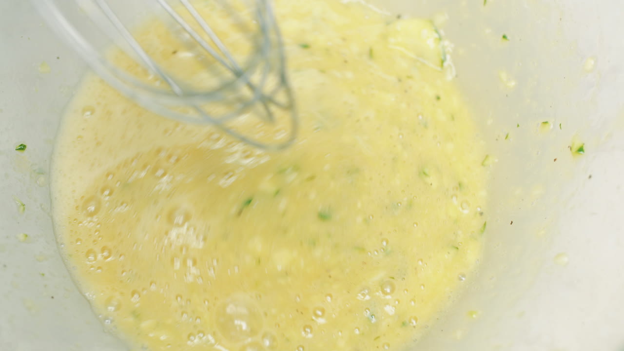 Hand Mixing Eggs Before Cooking