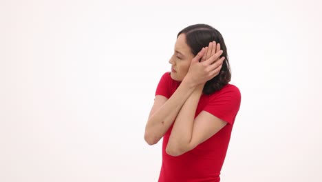 woman suffering from headache or discomfort on white background