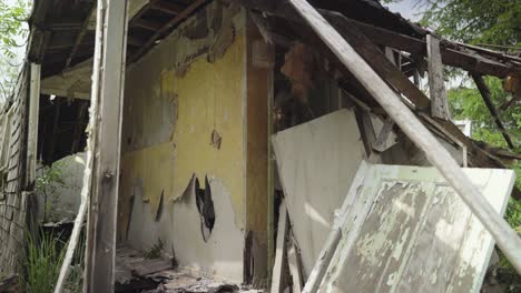 panning top to down footage revealing the ruins of a destroyed building