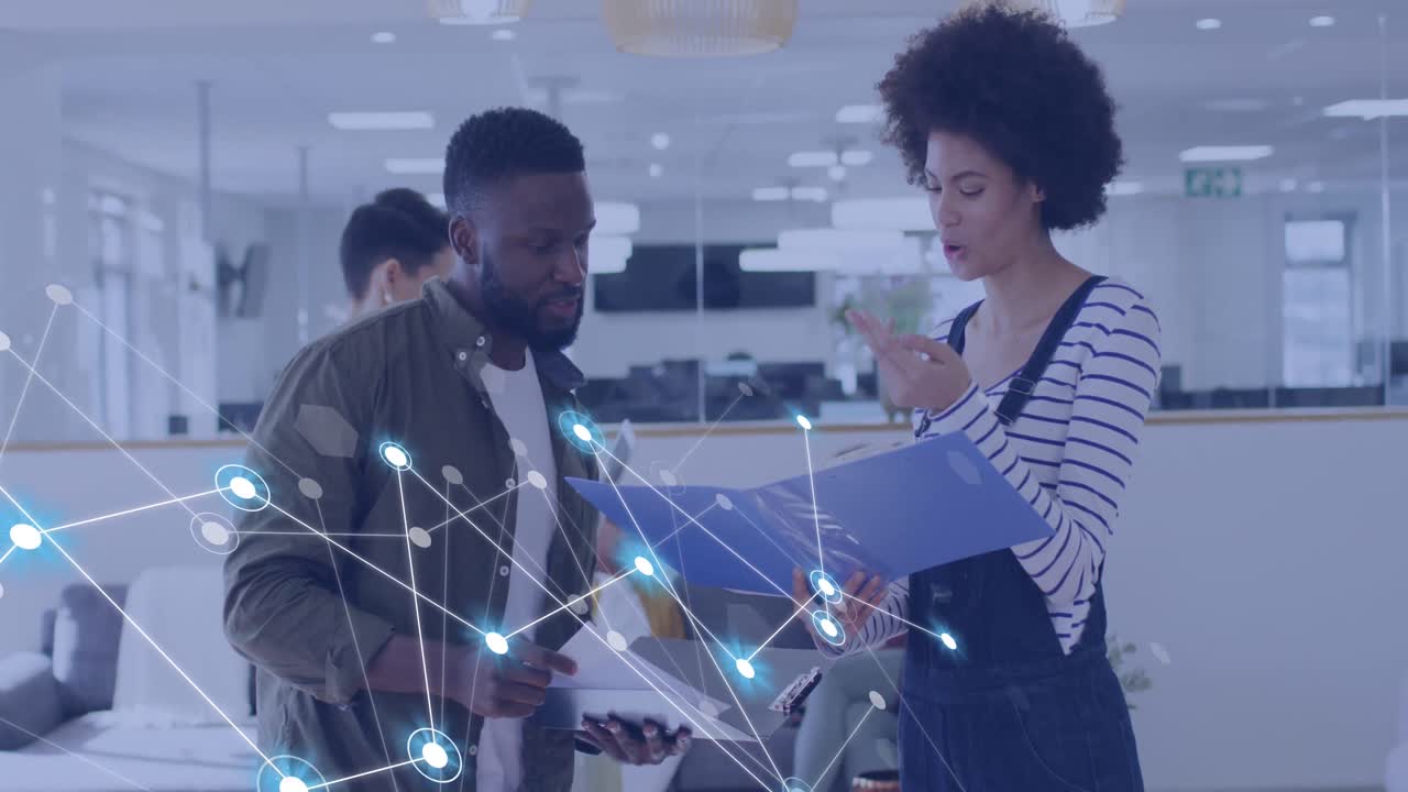 Animation of connections with icons over diverse business people in office