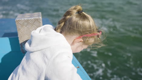 young girl on a boat