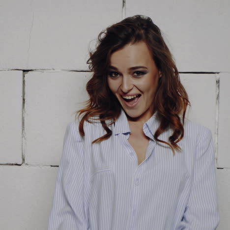 woman in a striped shirt smiling