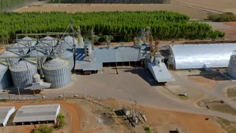 spectacular aerial view of wheat and sorghum storage silos captured by an orbiting drone