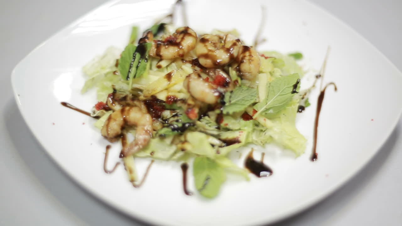 Fresh Salad With Seafood. Green salad with fresh leaves and shrimps