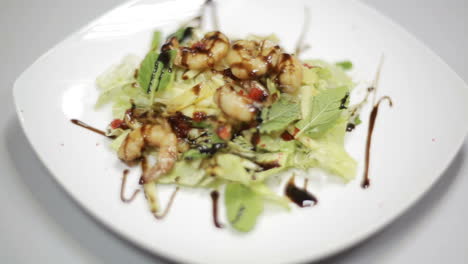 fresh salad with seafood. green salad with fresh leaves and shrimps