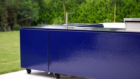 Moveable-outdoor-enamel-kitchen-in-garden