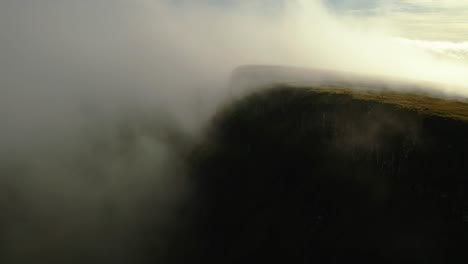 majestic mountain peak shrouded in fog