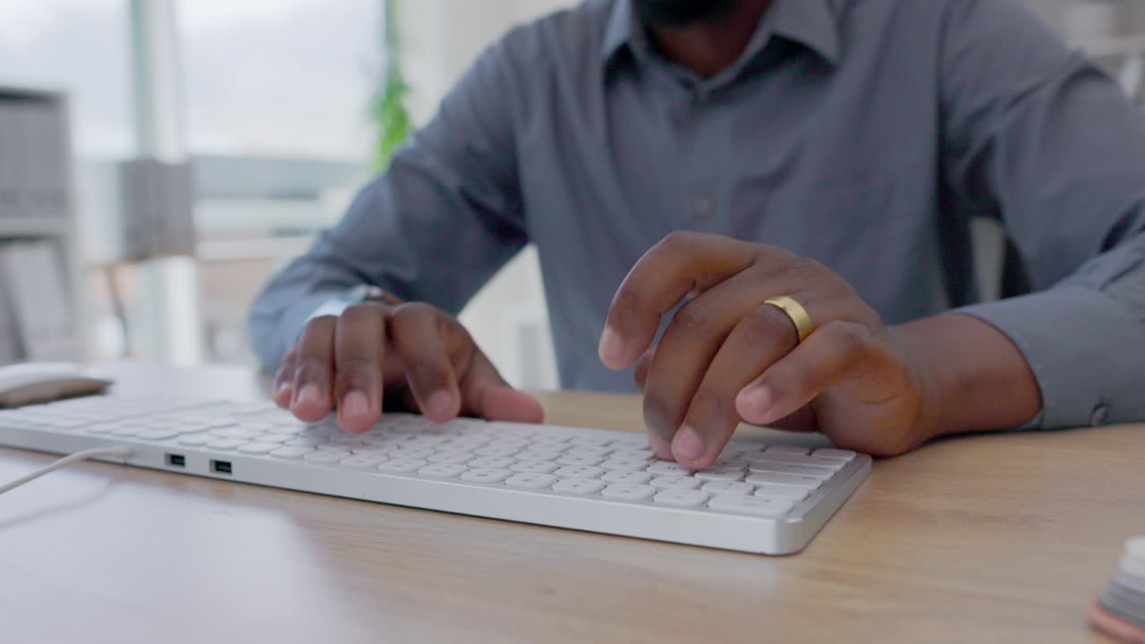 Hands, black man and keyboard computer in office