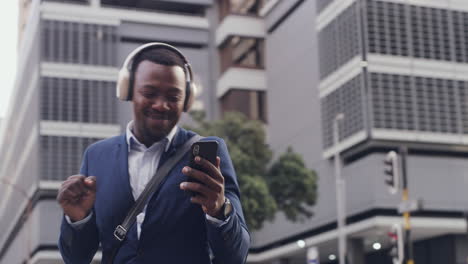 Dancing-businessman-listening-to-music