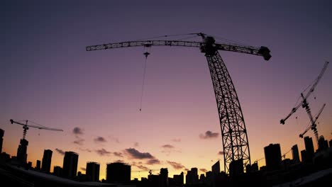 construction site silhouette at sunset