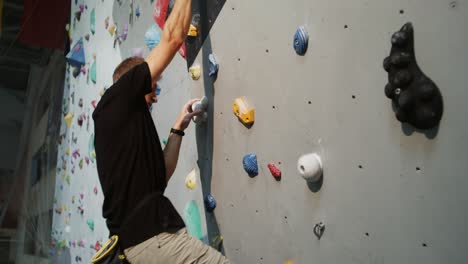 man rock climbing