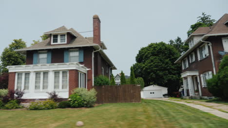 typical architecture of american country houses and suburbs ride along the american neighborhood