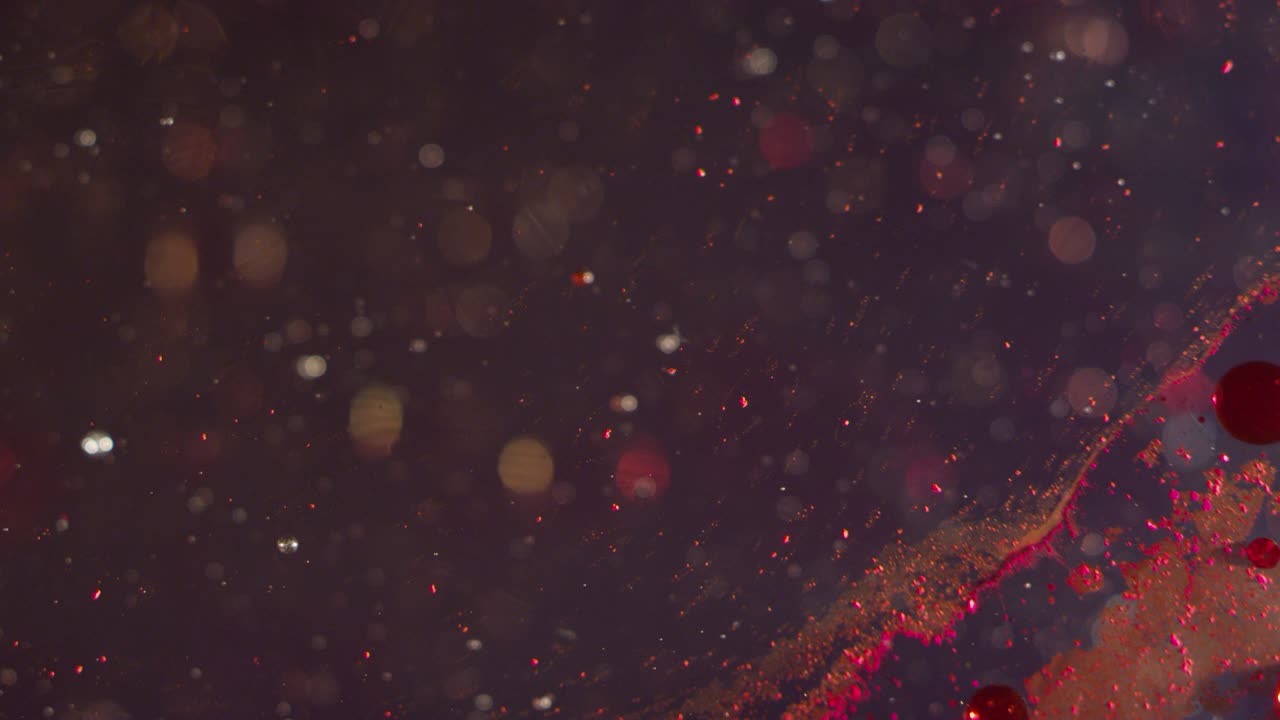 burbujas de esfera líquida roja abstracta salpicando y transformándose juntos fondo de textura