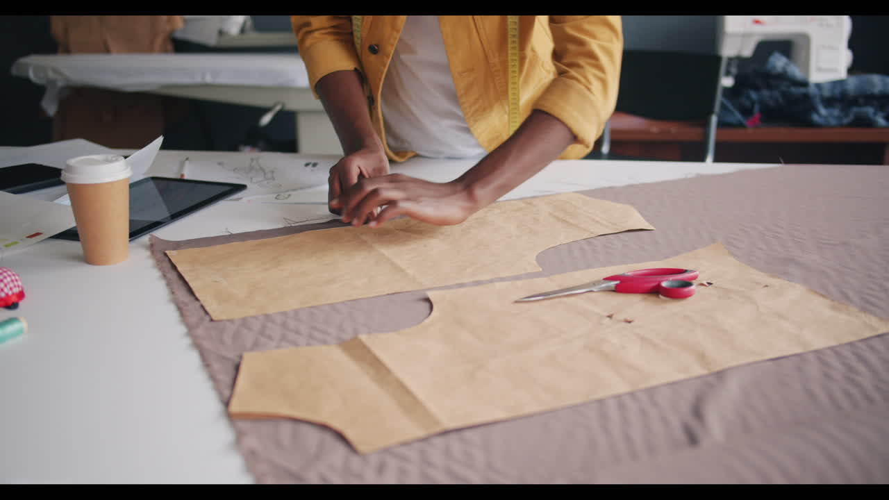 Person creating a garment pattern