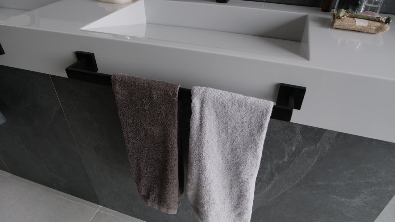 Modern Bathroom with Grey Towels