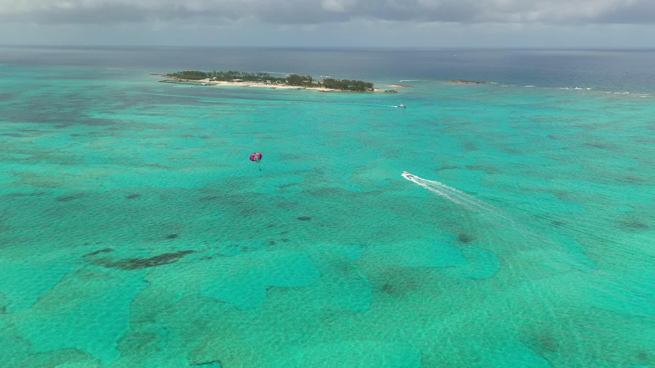 Bahamas, Nassau, Aerial View of Parasailing Parachute Above Boat and Turquoise Tropical Sea