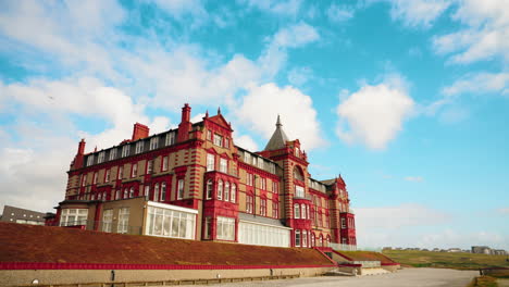 outside shot of the facade of the headland resort and spa in cornwall, united kingdom