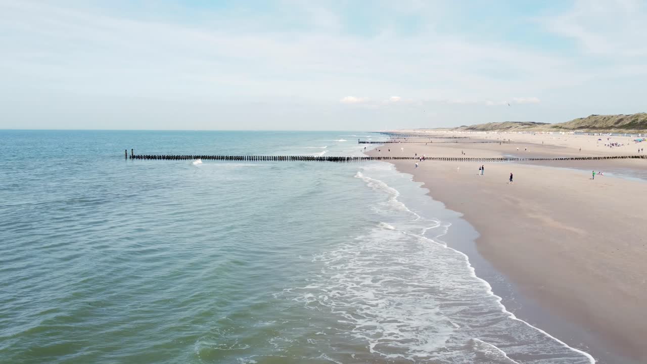 Long groynes at a beach in the netherlands