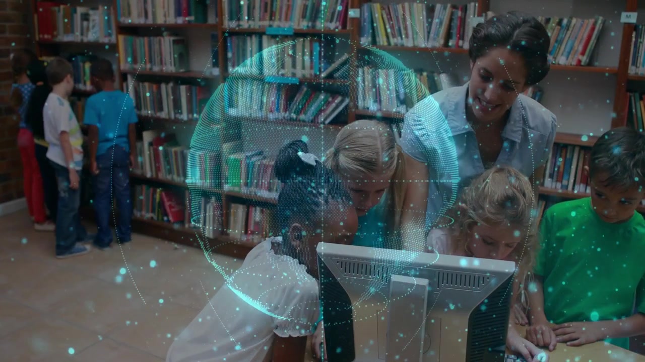 Teacher leaning over kids guiding library monitor, child reaching mouse and starting teal hologram