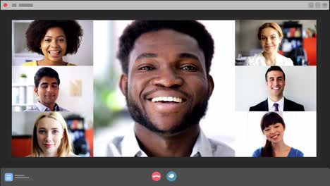 Diverse-man-group-of-business-people-having-online-business-conference-video-call-on-tv-screen-monit.Diverse-male-group-of-business-people-having-online-business-conference-video-call-on-tv-screen-monitor-in-board-meeting-room.-Slow-motion