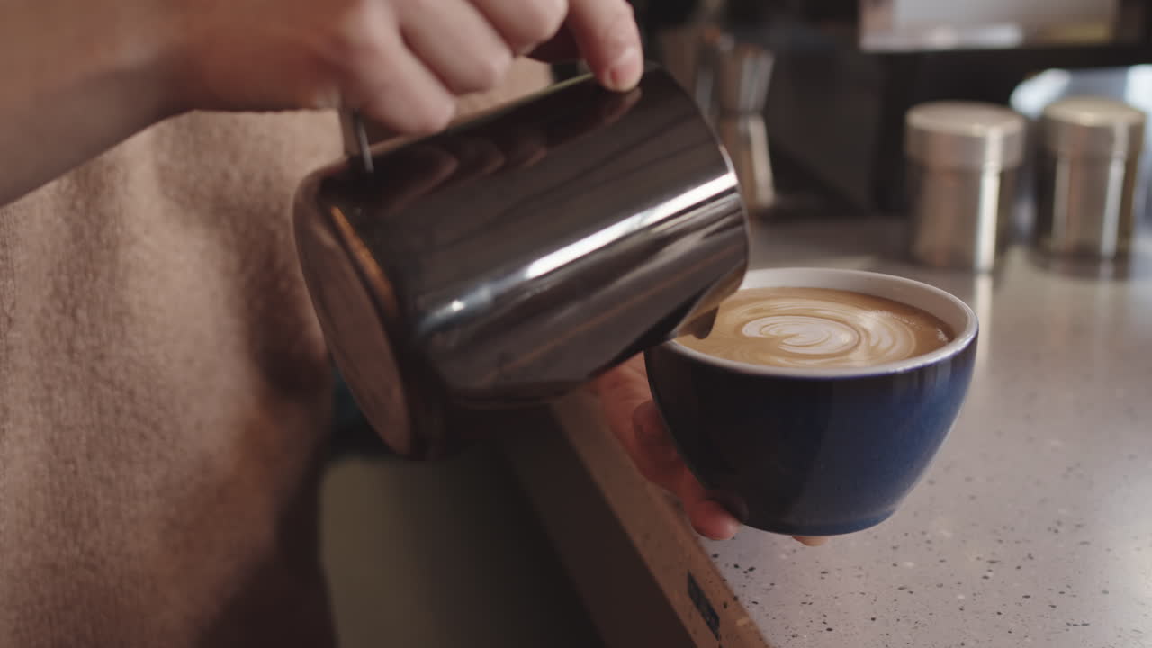 Unrecognizable Barista Making Cappuccino in Cafe
