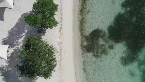 Aerial-overhead-ascending-shot-of-the-beach-of-Santa-Barbara-in-Curaçao